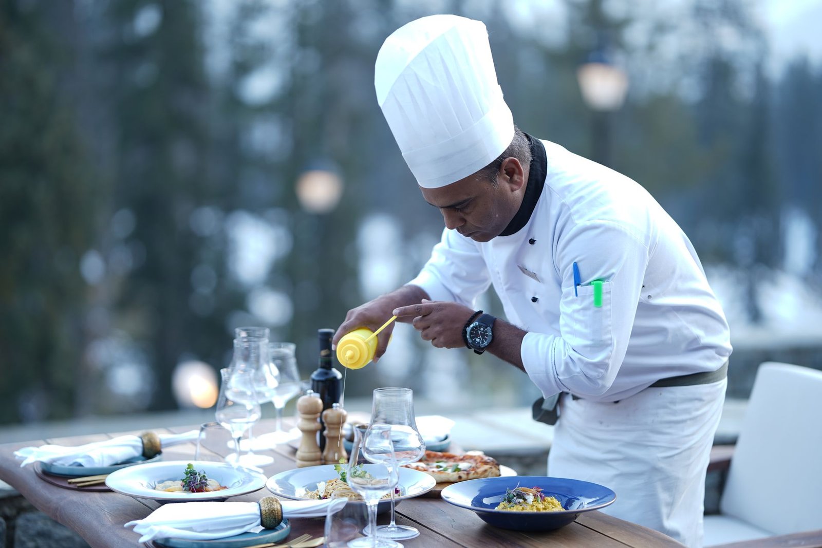 Chef preparing coffee as part of a hospitality experience